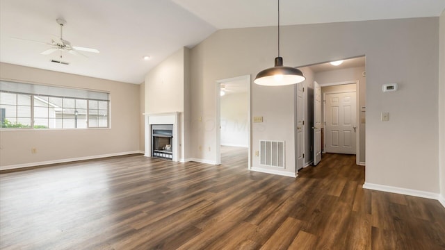 733 Windsor Ln, Heath, OH 43056 - unfurnished living room featuring ceiling fan, dark wood finished floors, a fireplace, and high vaulted ceiling