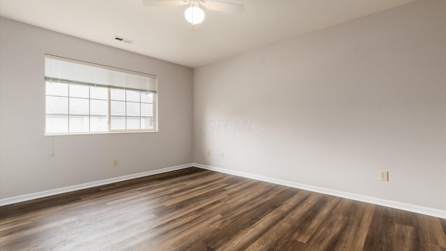 733 Windsor Ln, Heath, OH 43056 - unfurnished room featuring dark wood-type flooring and ceiling fan