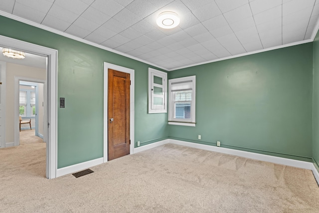 99 E N Broadway St, Columbus, OH 43214 - unfurnished bedroom featuring carpet, ornamental molding, and multiple windows