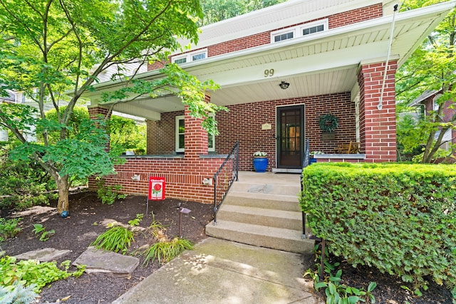 99 E N Broadway St, Columbus, OH 43214 - entrance to property with brick siding and a porch