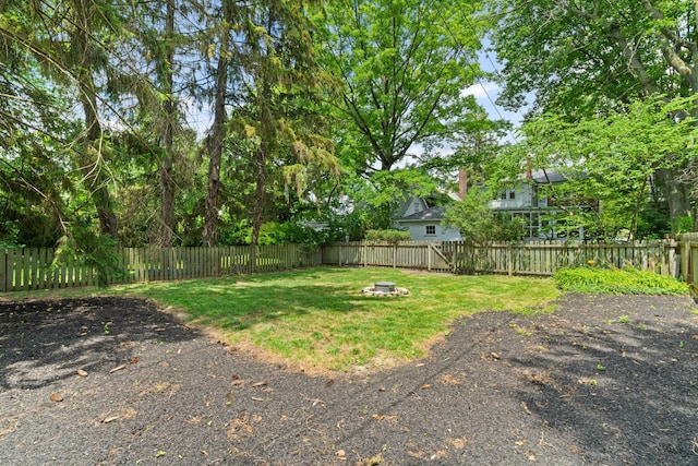 99 E N Broadway St, Columbus, OH 43214 - fenced backyard featuring a fire pit