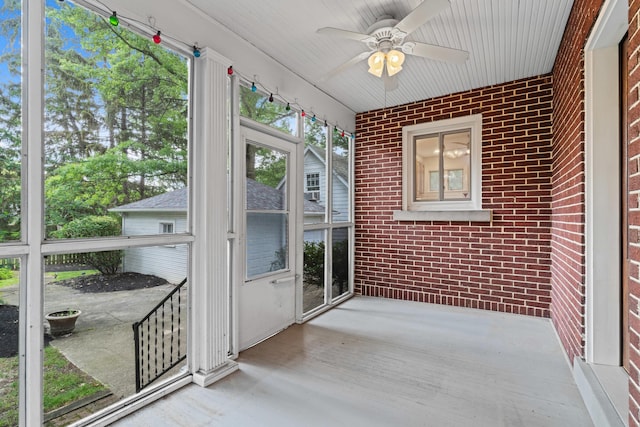 99 E N Broadway St, Columbus, OH 43214 - unfurnished sunroom featuring a ceiling fan