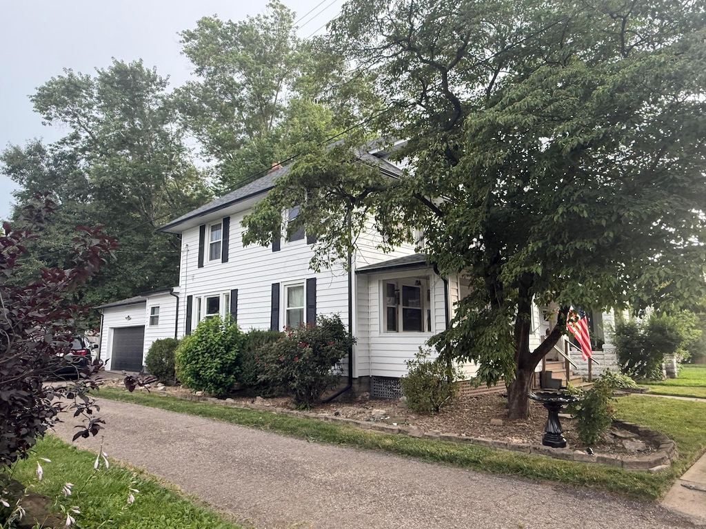 147 W Shields St, Newark, OH 43055 - colonial home featuring a garage