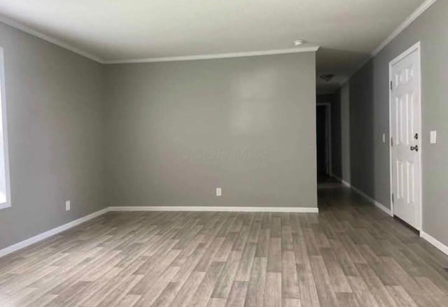1330 Hanover Rd Unit 507, Delaware, OH 43015 - unfurnished room with crown molding and wood finished floors