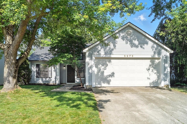 5975 Meadowsglen Dr, Dublin, OH 43017 - single story home with a garage, concrete driveway, and a front yard