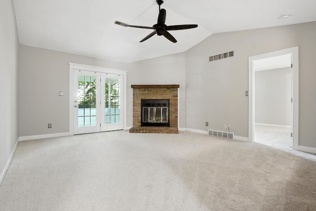 5975 Meadowsglen Dr, Dublin, OH 43017 - unfurnished living room featuring ceiling fan, vaulted ceiling, carpet flooring, and a brick fireplace