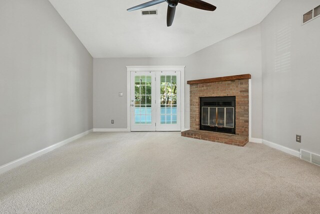 5975 Meadowsglen Dr, Dublin, OH 43017 - unfurnished living room with a ceiling fan, carpet floors, a brick fireplace, and vaulted ceiling