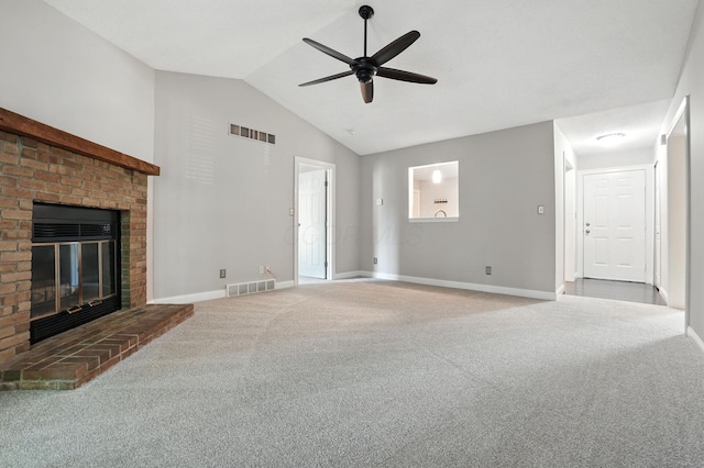 5975 Meadowsglen Dr, Dublin, OH 43017 - unfurnished living room with carpet, a ceiling fan, vaulted ceiling, and a brick fireplace
