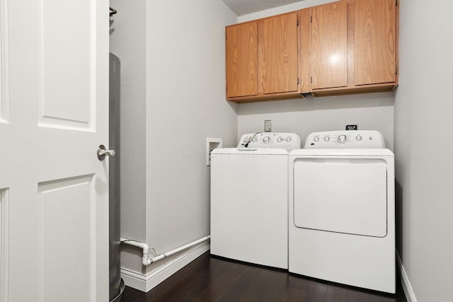 5975 Meadowsglen Dr, Dublin, OH 43017 - laundry room featuring cabinet space, separate washer and dryer, and dark wood-style flooring