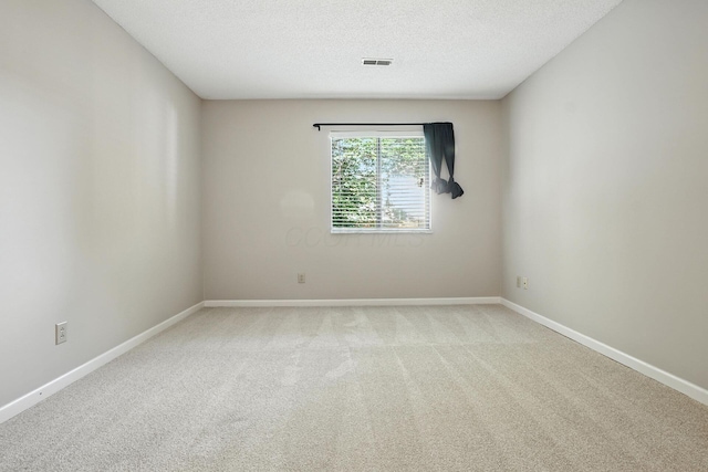 5975 Meadowsglen Dr, Dublin, OH 43017 - empty room featuring carpet flooring and a textured ceiling