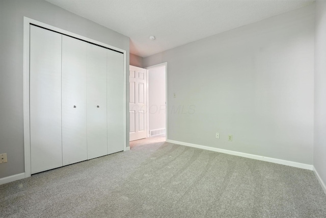 5975 Meadowsglen Dr, Dublin, OH 43017 - unfurnished bedroom featuring carpet and a closet