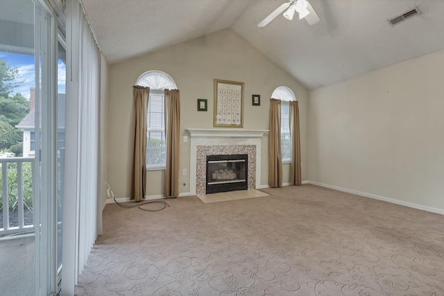 892 Shelbourne Pl, Newark, OH 43055 - unfurnished living room featuring ceiling fan, carpet flooring, healthy amount of natural light, and lofted ceiling