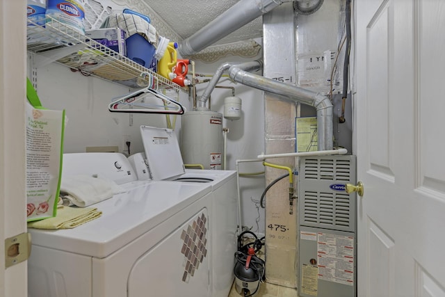 892 Shelbourne Pl, Newark, OH 43055 - washroom featuring gas water heater and washing machine and clothes dryer