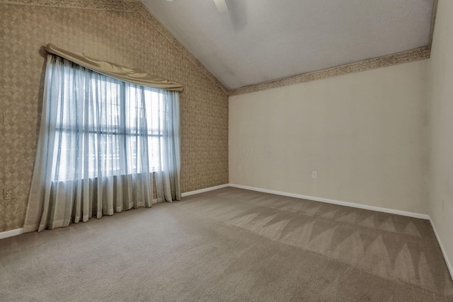892 Shelbourne Pl, Newark, OH 43055 - spare room with lofted ceiling, carpet, wallpapered walls, and a ceiling fan
