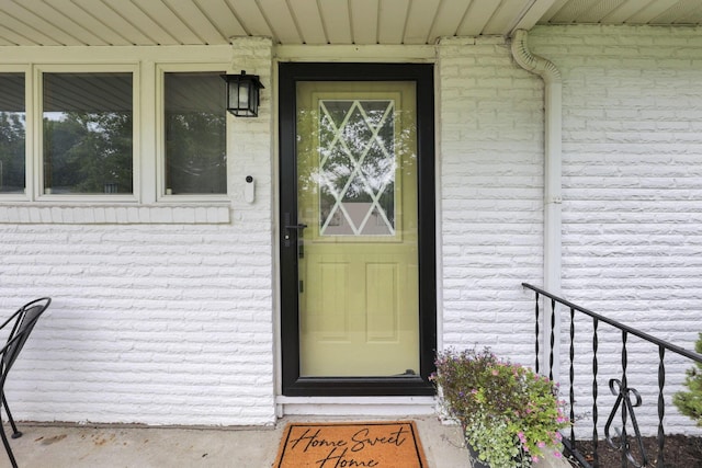 54 Barry Rd SW, Reynoldsburg, OH 43068 - view of exterior entry featuring brick siding