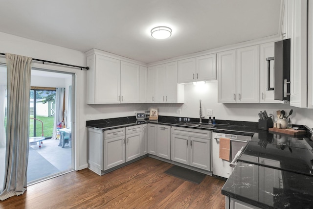 54 Barry Rd SW, Reynoldsburg, OH 43068 - kitchen featuring dishwashing machine, dark wood finished floors, white cabinetry, dark stone counters, and black range with electric cooktop