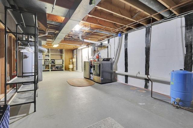 54 Barry Rd SW, Reynoldsburg, OH 43068 - unfinished below grade area with a water pressure tank and gas water heater