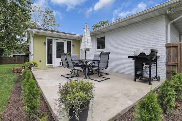 54 Barry Rd SW, Reynoldsburg, OH 43068 - view of patio / terrace featuring a grill and outdoor dining area