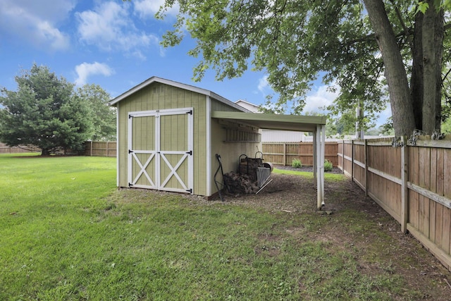 54 Barry Rd SW, Reynoldsburg, OH 43068 - view of shed with a fenced backyard and an attached carport