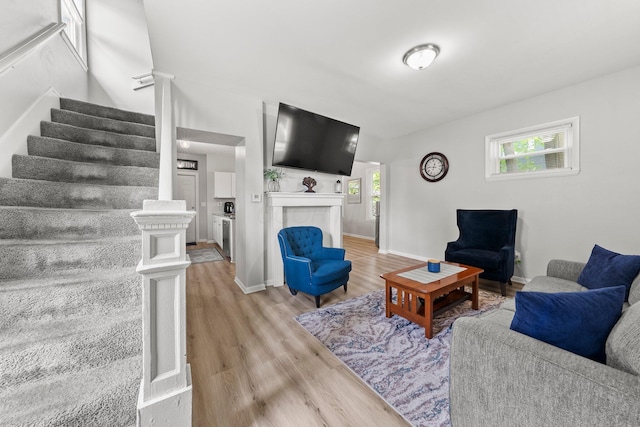 1008 E Whittier St, Columbus, OH 43206 - living room with stairs and light wood-type flooring
