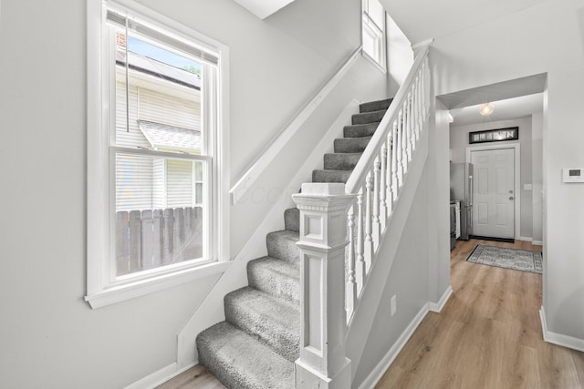 1008 E Whittier St, Columbus, OH 43206 - stairs with wood finished floors and baseboards
