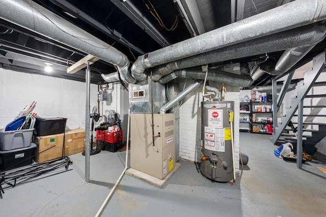1008 E Whittier St, Columbus, OH 43206 - unfinished basement featuring gas water heater, heating unit, and stairs