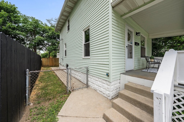 1008 E Whittier St, Columbus, OH 43206 - view of property exterior featuring a gate and covered porch