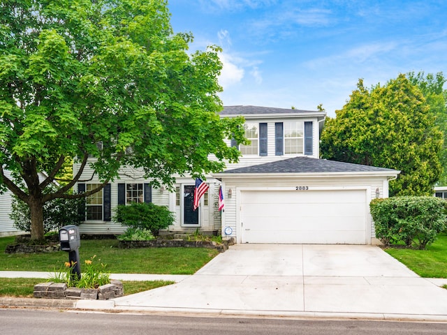 2883 Castlebrook Ave, Hilliard, OH 43026 - view of front facade with concrete driveway, a front yard, roof with shingles, and an attached garage