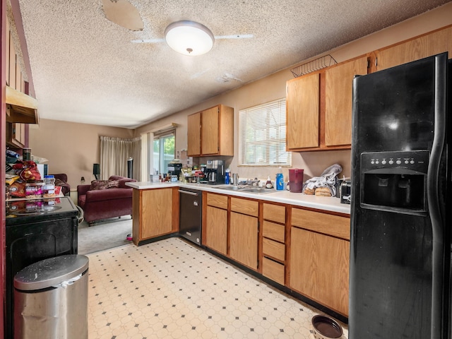 2883 Castlebrook Ave, Hilliard, OH 43026 - kitchen with black refrigerator with ice dispenser, open floor plan, light countertops, dishwashing machine, and a textured ceiling