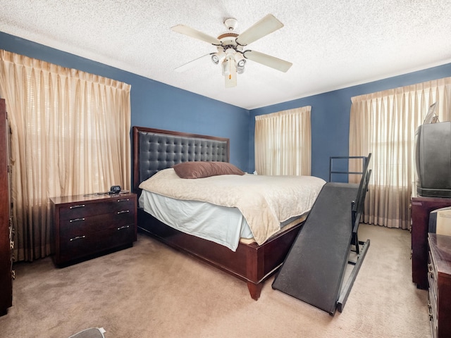 2883 Castlebrook Ave, Hilliard, OH 43026 - bedroom featuring light carpet, a textured ceiling, and a ceiling fan