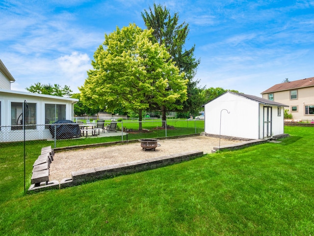 2883 Castlebrook Ave, Hilliard, OH 43026 - view of yard with a fire pit, a shed, and a patio area