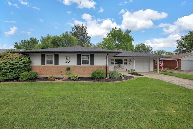 1418 Clemens Pl, Reynoldsburg, OH 43068 - single story home with brick siding, a garage, driveway, and a front yard
