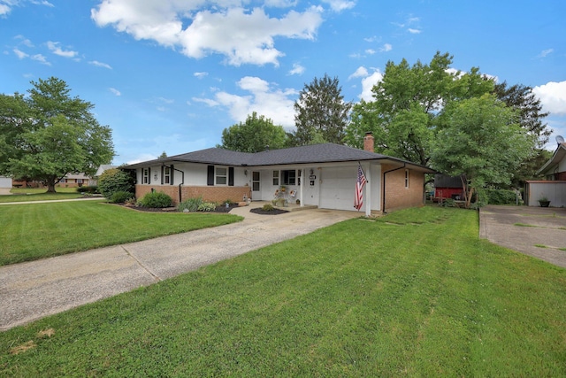 1418 Clemens Pl, Reynoldsburg, OH 43068 - ranch-style house with a garage, concrete driveway, brick siding, a chimney, and a front yard