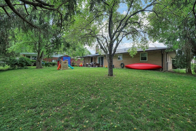 1418 Clemens Pl, Reynoldsburg, OH 43068 - view of grassy yard with a playground