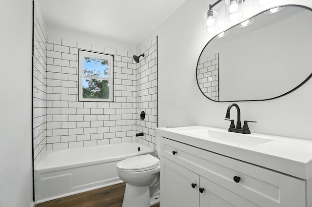 5244 Refugee Rd, Columbus, OH 43232 - bathroom with vanity, wood finished floors, and  shower combination