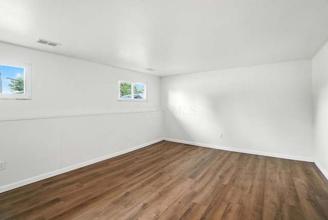 5244 Refugee Rd, Columbus, OH 43232 - empty room featuring dark wood-style flooring and baseboards