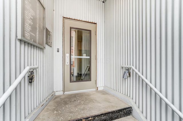 444 N Front St Unit 312, Columbus, OH 43215 - property entrance with board and batten siding