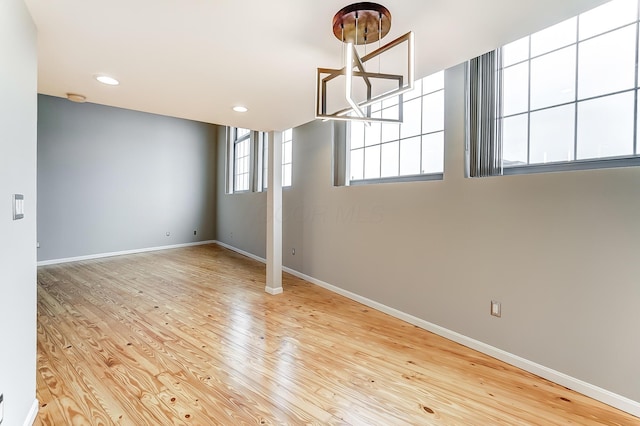 444 N Front St Unit 312, Columbus, OH 43215 - empty room with wood finished floors, recessed lighting, a chandelier, and a smoke detector