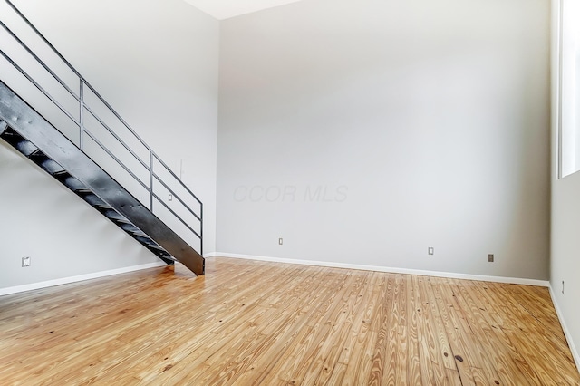 444 N Front St Unit 312, Columbus, OH 43215 - unfurnished room with wood finished floors and stairs