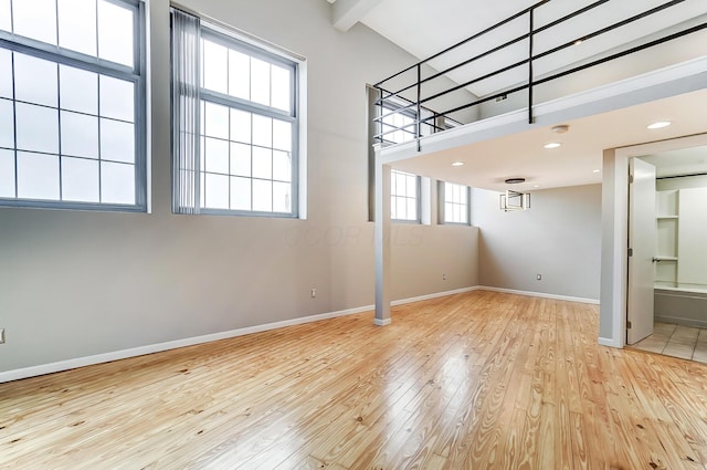 444 N Front St Unit 312, Columbus, OH 43215 - unfurnished bedroom featuring hardwood / wood-style floors and baseboards