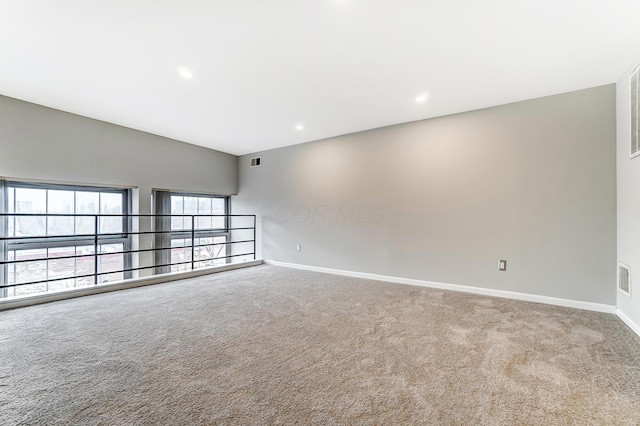 444 N Front St Unit 312, Columbus, OH 43215 - carpeted empty room with baseboards and recessed lighting