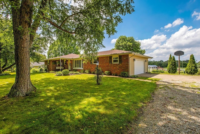 3251 Old Mill Rd NE, Lancaster, OH 43130 - single story home with a garage, brick siding, driveway, and a front yard