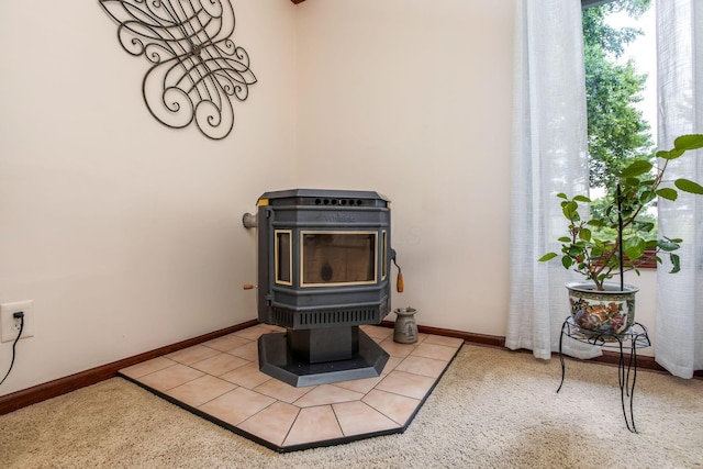 3251 Old Mill Rd NE, Lancaster, OH 43130 - detailed view of a wood stove and carpet flooring