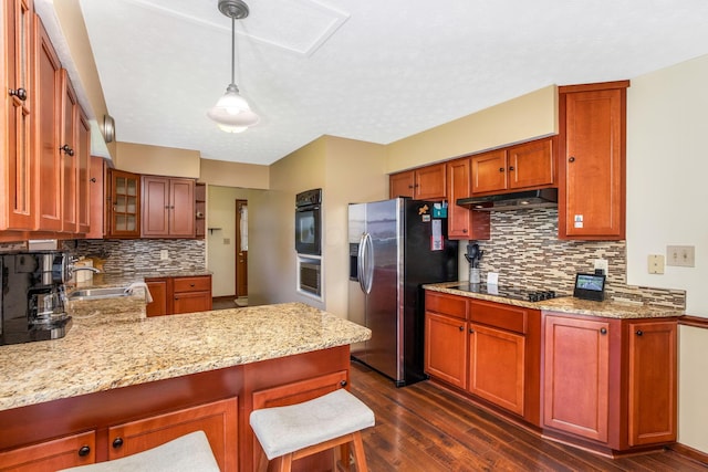 3251 Old Mill Rd NE, Lancaster, OH 43130 - kitchen with black appliances, backsplash, dark wood-style flooring, a peninsula, and under cabinet range hood