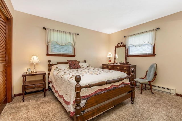 3251 Old Mill Rd NE, Lancaster, OH 43130 - carpeted bedroom with a baseboard heating unit and a closet