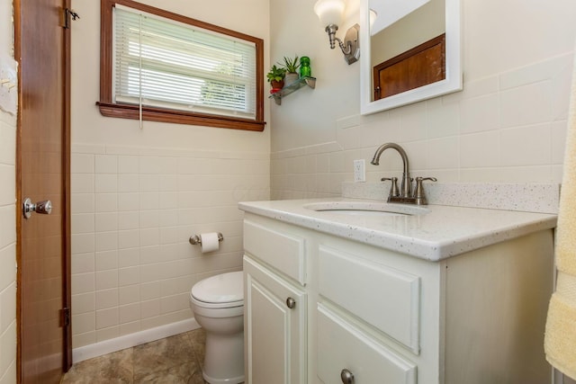 3251 Old Mill Rd NE, Lancaster, OH 43130 - bathroom featuring tile walls, vanity, and tile patterned flooring