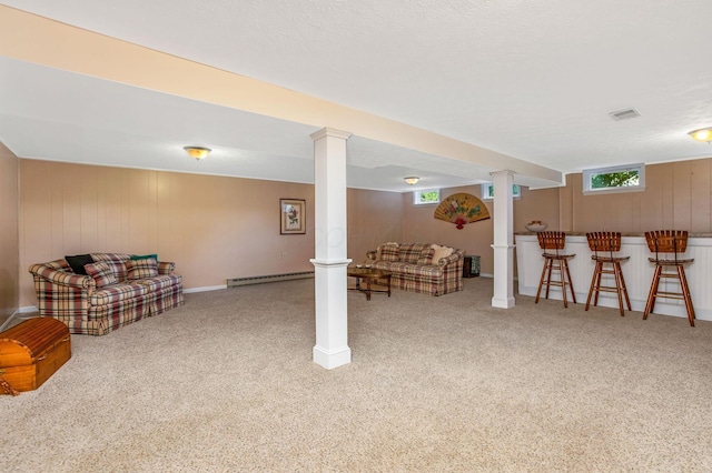 3251 Old Mill Rd NE, Lancaster, OH 43130 - basement featuring a baseboard radiator, carpet floors, and a bar