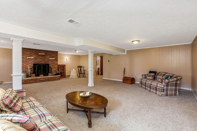 3251 Old Mill Rd NE, Lancaster, OH 43130 - living room with a textured ceiling, carpet flooring, ornate columns, and a fireplace