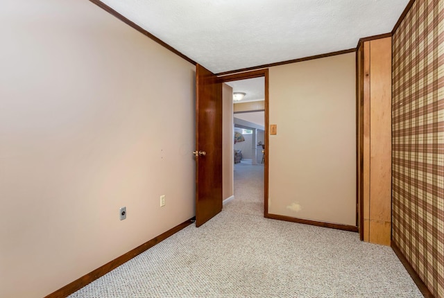 3251 Old Mill Rd NE, Lancaster, OH 43130 - unfurnished room featuring crown molding, light carpet, and a textured ceiling