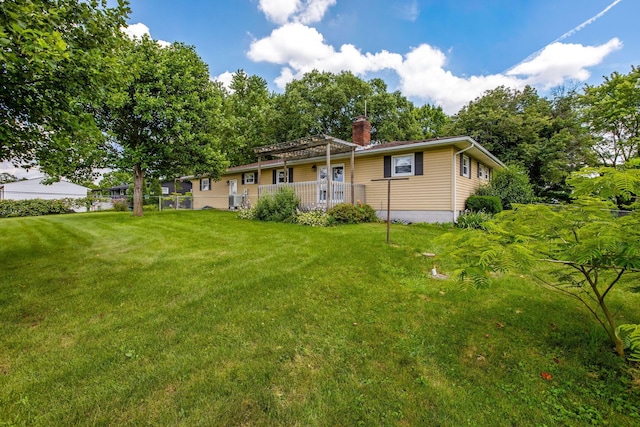 3251 Old Mill Rd NE, Lancaster, OH 43130 - rear view of house featuring a chimney, a pergola, and a yard
